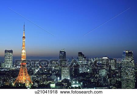 Tokyo Tower and office buildings in the night, long exposure, Tokyo prefecture, Japan View Large Photo Image Stock Photo - Tokyo Tower and office buildings in the night, long exposure, Tokyo prefecture, Japan. Fotosearch
