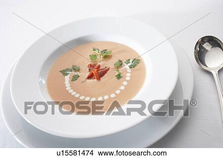 Picture - Tomato potage in bowl. Fotosearch