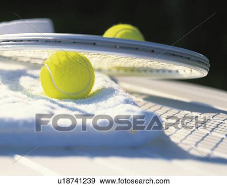 Stock Photo - Towel, tennis balls and tennis racket. Fotosearch