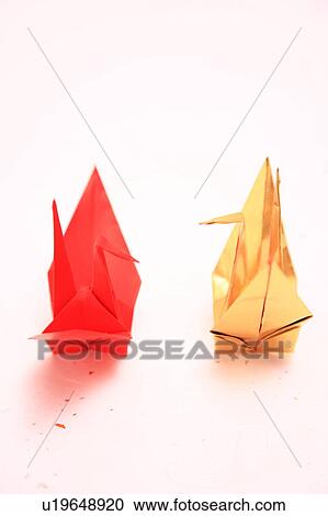 Two Origami birds, white background View Large Photo Image Stock Image - Two Origami birds, white background. Fotosearch