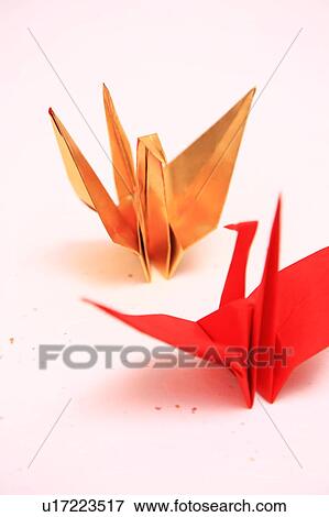 Stock Photo - Two Origami birds, white background. Fotosearch
