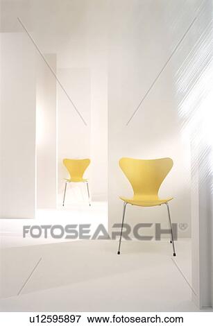 Stock Photo - Two yellow chairs in modern room. Fotosearch