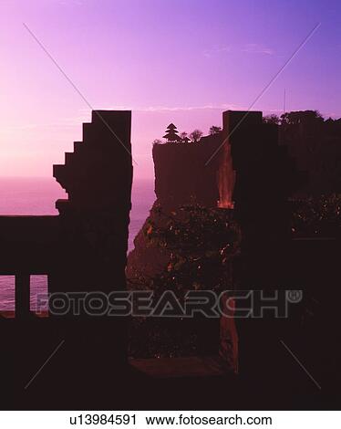 Stock Image - Uluwatu Temple at sunset, Bali, Indonesia. Fotosearch