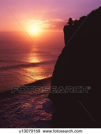 Uluwatu Temple at sunset, Bali, Indonesia View Large Photo Image Stock Photo - Uluwatu Temple at sunset, Bali, Indonesia. Fotosearch