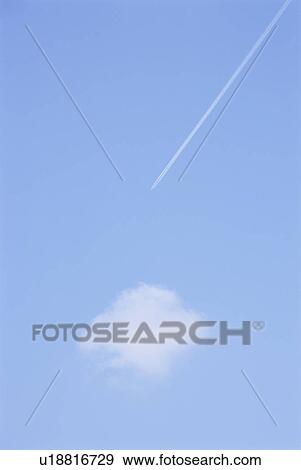 Vapor trail in sky View Large Photo Image Stock Photo - Vapor trail in sky. Fotosearch