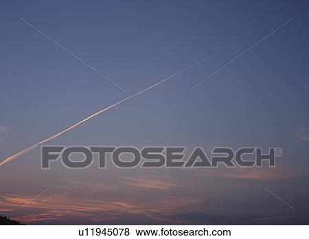 Stock Photo - Vapor trail in the sky. Fotosearch