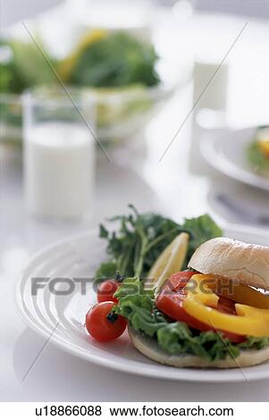 Stock Photo - Vegetarian sandwich with glass of milk. Fotosearch