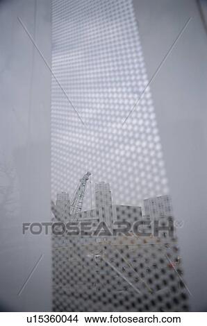 Picture - View of a Construction Site Through a Fence. Koto-ku, Tokyo, Japan. Fotosearch