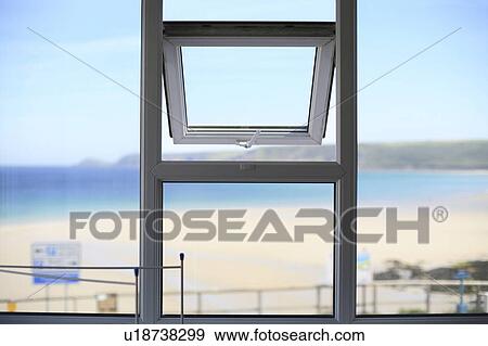 View of beach through window View Large Photo Image Stock Photo - View of beach through window. Fotosearch