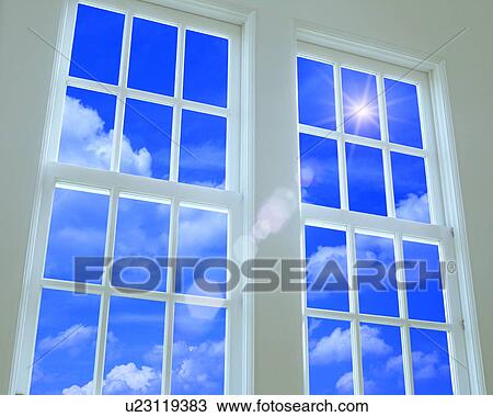 Stock Image - View of sky through window, computer graphic, lens flare. Fotosearch