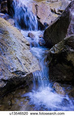 Water cascading down Yobai Waterfall, Otsu, Shiga Prefecture, Japan View Large Photo Image Stock Image - Water cascading down Yobai Waterfall, Otsu, Shiga Prefecture, Japan. Fotosearch
