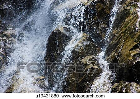Water cascading down Yobai Waterfall, Otsu, Shiga Prefecture, Japan View Large Photo Image Stock Image - Water cascading down Yobai Waterfall, Otsu, Shiga Prefecture, Japan. Fotosearch