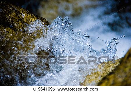 Stock Photography - Water cascading down Yobai Waterfall, Otsu, Shiga Prefecture, Japan. Fotosearch