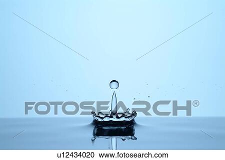 Stock Image - Water droplet splashing . Fotosearch