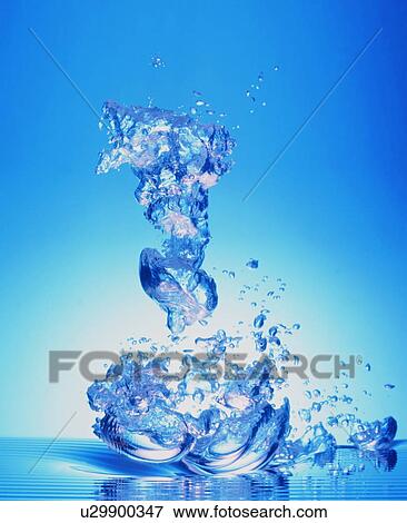 Stock Photo - Water drops falling towards surface. Fotosearch