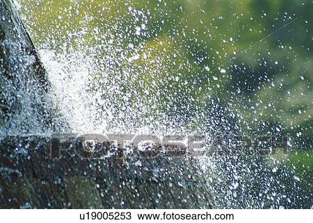 Water hitting rock View Large Photo Image Stock Image - Water hitting rock. Fotosearch