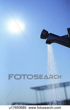 Stock Photography - Water running from faucet. Fotosearch