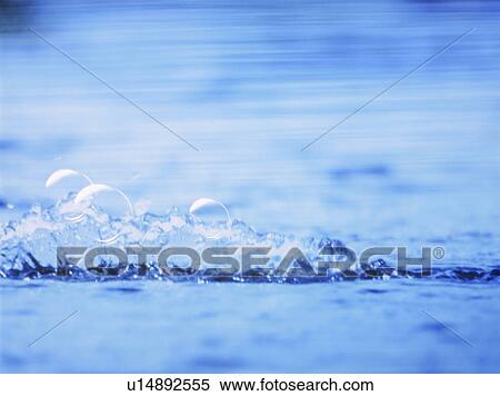 Stock Photography - Water splashing, close up, full frame. Fotosearch