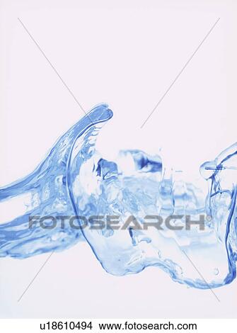 Picture - Water splashing, close up, white background. Fotosearch