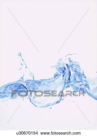 Picture - Water splashing, close up, white background. Fotosearch