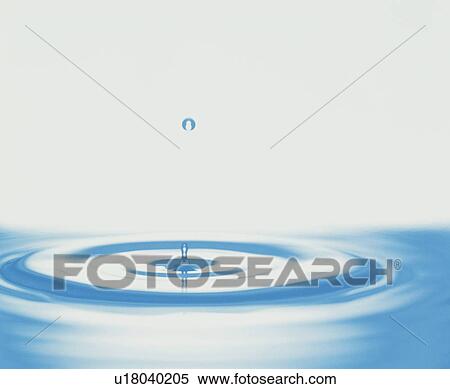 Stock Photography - Waterdrop and ripples on water surface. Fotosearch