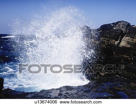 Waves breaking on rock, Oahu, Hawaii, USA View Large Photo Image Stock Photograph - Waves breaking on rock, Oahu, Hawaii, USA. Fotosearch