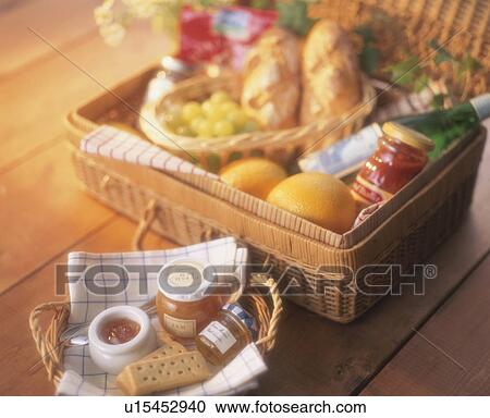 Well stuffed picnic basket with fresh fruit and bread View Large Photo Image Stock Image - Well stuffed picnic basket with fresh fruit and bread. Fotosearch