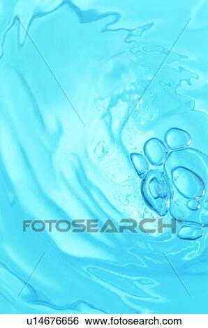 Whirlpool and bubbles in blue water View Large Photo Image Stock Photograph - Whirlpool and bubbles in blue water. Fotosearch