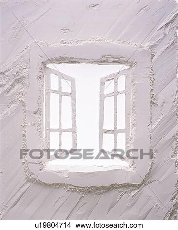 Picture - White window made out of plaster. Fotosearch