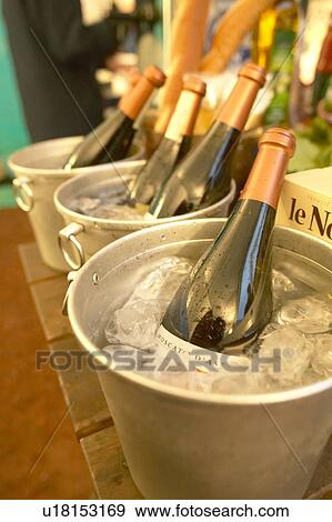 Wine Bottles in Ice Buckets. Tokyo Prefecture, Japan View Large Photo Image Stock Photo - Wine Bottles in Ice Buckets. Tokyo Prefecture, Japan. Fotosearch