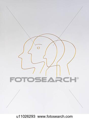 Stock Image - Wire sculpted into human faces. Fotosearch