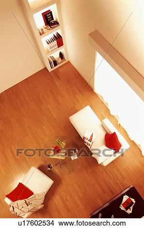 Wooden floored room with chaise longue View Large Photo Image Picture - Wooden floored room with chaise longue. Fotosearch