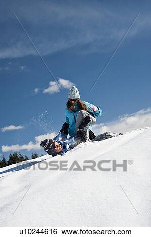 Couple playing with snow View Large Photo Image Stock Photograph - Couple playing with snow. Fotosearch