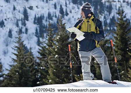 Young man in snow hiking View Large Photo Image Stock Photography - Young man in snow hiking. Fotosearch