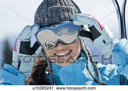 Young woman with ski shades View Large Photo Image Stock Image - Young woman with ski shades. Fotosearch