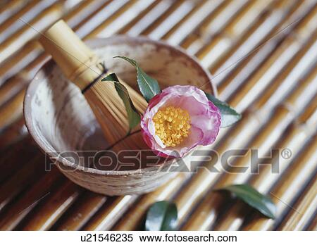 A camellia, a teacup, and a bamboo whisk View Large Photo Image Stock Photography - A camellia, a teacup, and a bamboo whisk. Fotosearch