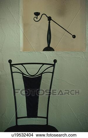 A chair and a sculpture View Large Photo Image Picture - A chair and a sculpture. Fotosearch