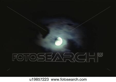 A full moon emerging from behind clouds View Large Photo Image Stock Image - A full moon emerging from behind clouds. Fotosearch