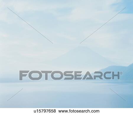 Stock Photo - A misty mountain. Fotosearch