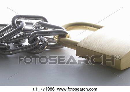 Stock Photograph - A padlock and a chain. Fotosearch