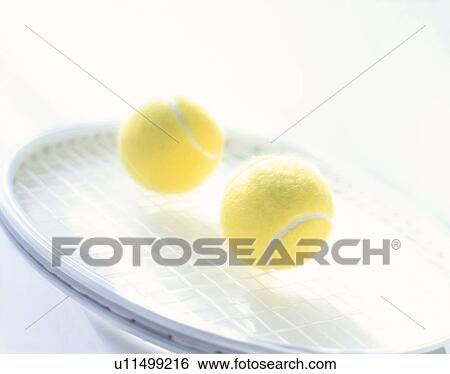 A tennis racket and two tennis balls View Large Photo Image Stock Photograph - A tennis racket and two tennis balls. Fotosearch