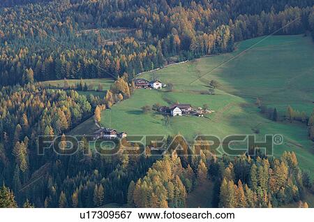 Stock Photo - Aerial view of farmhouses. Dolomites, Italy. Fotosearch