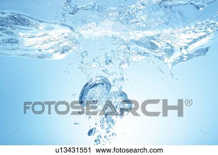Air bubbles in water, close up, blue background View Large Photo Image Stock Image - Air bubbles in water, close up, blue background. Fotosearch