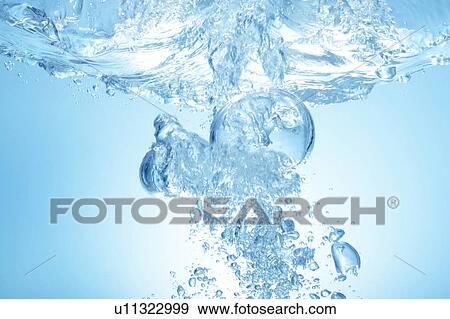 Air bubbles in water, close up, blue background View Large Photo Image Stock Photo - Air bubbles in water, close up, blue background. Fotosearch
