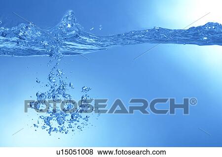 Stock Photo - Air bubbles in water, close up, blue background. Fotosearch