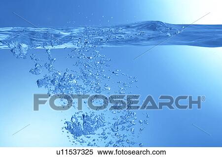 Air bubbles in water, close up, blue background View Large Photo Image Stock Photography - Air bubbles in water, close up, blue background. Fotosearch