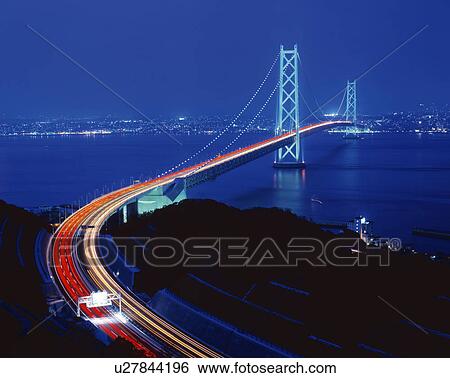 Stock Photograph - Akashi strait bridge at dusk, Awaji, Hyogo Prefecture, Japan. Fotosearch