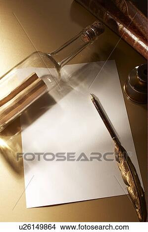 Picture - Antique hotel stationery and bottle. Fotosearch