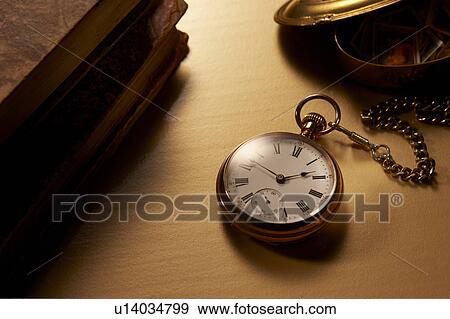 Antique pocket watch and books View Large Photo Image Stock Photo - Antique pocket watch and books. Fotosearch