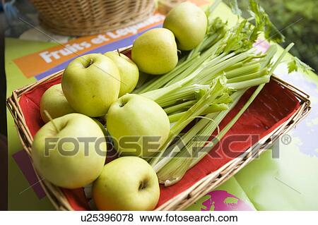Stock Photo - Apples and celery. Fotosearch
